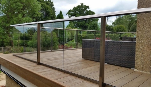 Balcony and terrace glass fencing in Dubai with tempered laminated safety glass, premium channel base finish, wind-load stability, and modern open-view protection